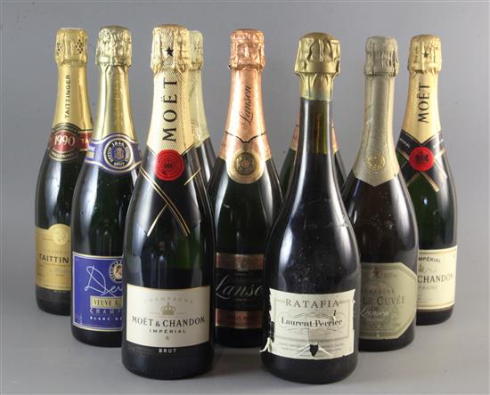 Nine assorted bottles of champagne including two Lanson, two Moet & Chandon, one Tattinger, 1990 and